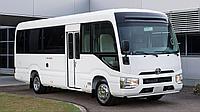 Доставка и развозка персонала на автобусе Toyota Coaster 22 места в Астане