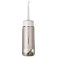Ирригатор для полости рта REVYLINE RL 420, портативный, емкость резервуара 0,18 л, 2 насадки, белый1