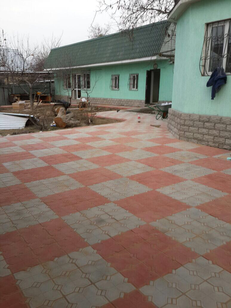 Укладка тротуарной плитки и брустчатки